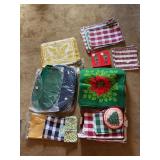 Large grouping of holiday linens - mostly placemats and napkins (see all pics)