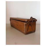 Antique wooden seaman’s ditty box, likely from the 19th century, designed with dovetail construction and featuring a leather handle….does have melted candles in bottom