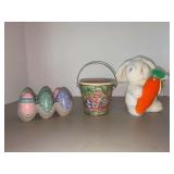 Grouping of Easter decor…..from left - 1/2 dozen handcrafted wooden eggs, Dinstuhl’s candy tin and GUND plush rabbit with carrot