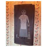 Arthur Glazier Primitive Americana Folk Art Wood Painting: Woman with butter churn, basket of flowers and cat…..17-3/4 x 36