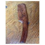 Vintage hand carved wooden spreader…..9-1/2” long