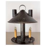 Primitive-style table lamp, often categorized as a Williamsburg or Shaker-style tin lamp…..working condition…..9” wide x 13-1/2” tall