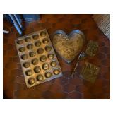 Grouping of vintage bakeware and cookie cutters