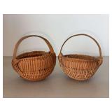 (2) miniature Pennsylvania Dutch buttock bottom baskets…..3-3/4” tall