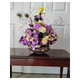 Spring Bouquet, artificial, in a low clear glass footed bowl filled with potpourri, bowl is 4' T x 10' across, arrangement is 19' T x 15' across.