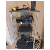 5 Tier Audio Rack, 52 1/2' T, 30' W x 23' D, half circle design, would fit in corner, 3 middle glass shelves, composite top and bottom shelf, perforated metal back, round flat feet. Other contents not