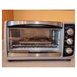 Black+Decker 6-Slice Convection Toaster Oven, likely model TO1675B Type 1. Large interior fits a 9-inch pizza or 6 slices of bread. Good Condition . Untested.