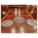 Grouping: Federal Glass footed cake plate sunburst and dots, Crocheted Crystal Imperial Glass. Cristal d'Arques-Durand serving platter in the Diamant pattern.