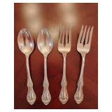 Sterling 'Wild Rose' pattern  2 salad forks, 2 dinner spoons. Weighs 131 grams.