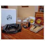Cigars International: 2 'on-the-rocks' tumbler glasses, 1 Ripple Triple Torch Cigar Lighter in a gunmetal finish, 1 guillotine-style cigar cutter, 1 well seasoned marble cigar ashtray, 2 Cigar Interna