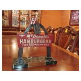 McDonald's 35 years of service award, double sided, heavy, powder coated metal on marble base, produced by MTM Recognition, has service plate on one side of base, could be removed. 13 1/2' T x 13' W.