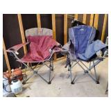 2 Northwest Territory folding camping chairs, with carrying bags. They are large inside the arms 25' across. Other items not included.