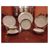 Sone China 7 piece place setting, dinner plate, salad plate, bread & butter plate, soup bowl, fruit/dessert bowl, tea cup & saucer. Stunning black & gold pattern, hand painted. Made in Japan.