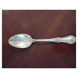 Sterling 'Wild Rose' pattern Serving Spoon weighing 63 grams.
