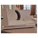 Electric compact household food slicer, for meats, cheeses, and bread. Untested