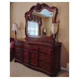Haverty's Dresser with Mirror, 9 drawers, with mirror 89' T, dresser 38' T x 74' W x 25' D.