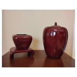 2 Vintage Haeger art pottery vase on base 7 1/2' T and a lidded jar 12' T in a burgundy glaze. 2 Candlesticks ***Addition 3/20*** Low profile dish.