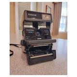 Vintage Polaroid OneStep Close-up 600 instant film camera.