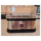 200W stainless steel electric egg cooker. Cooks up to 6 eggs at a time.  Steams eggs to soft, medium, or hard-boiled, and can also steam vegetables. Like new. Untested