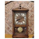 Centurion 35-Day Mantel Clock manufactured in Korea. 
Type: Mechanical wind-up pendulum clock. 
Winding Interval: Designed to run for approximately 35 days on a single winding, with key, 19 1/2' T x 9