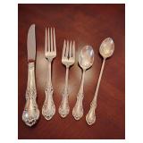 Sterling 'Wild Rose' pattern 5 piece place setting, knife, dinner fork, salad fork, dinner spoon, tea spoon. Weighs 144 grams.