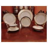 Sone China 7 piece place setting, dinner plate, salad plate, bread & butter plate, soup bowl, fruit/dessert bowl, tea cup & saucer. Stunning black & gold pattern, hand painted. Made in Japan.