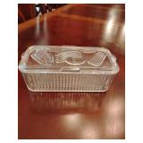 Vintage Federal Glass refrigerator dish featuring ribbed sides and an embossed vegetable design on the lid. 3 1/2' T x 8 1/2' L x 4 1)4' W