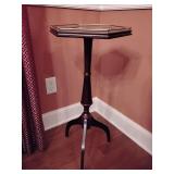 Bombay Company octagonal pedestal table featuring a gold-tone gallery rail and a tripod base. 29 1/2' T x 14' across