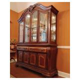 Gorgeous Haverty's Seville Breakfront 4 beautiful etched glass doors atop with internal lighting and 2 glass shelves, mirrored back, glass side panels, 2 drawers in the middle and 4 door compartments 