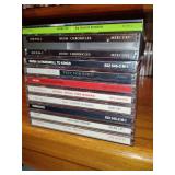 CD's, 1 Geedy Lee, 9 RUSH (1 is box set)