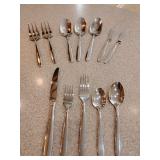 Oneida Flatware Everyday with Serving Pieces, 15 place settings. They just feel good in your hand, nice. Also with a great drawer caddy.