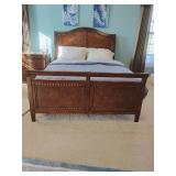 Queen Bed Traditional 92' L x 64' W x headboard height 57', dark wood, very attractive styling. 4 pillows, sheets, UGG Comforter, really nice mattress can't find maker.