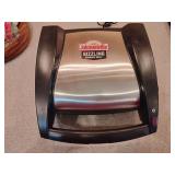 Johnsonville Sizzling Sausage Grill, specifically model BTG0498. Untested.