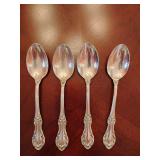 Sterling 'Wild Rose' pattern 4 dinner spoons weighing 117 grams.