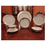 Sone China 7 piece place setting, dinner plate, salad plate, bread & butter plate, soup bowl, fruit/dessert bowl, tea cup & saucer. Stunning black & gold pattern, hand painted. Made in Japan.