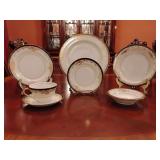 Sone China 7 piece place setting, dinner plate, salad plate, bread & butter plate, soup bowl, fruit/dessert bowl, tea cup & saucer. Stunning black & gold pattern, hand painted. Made in Japan.