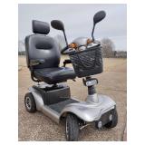 Drive Medical Prowler 4-Wheel Mobility Scooter. 
Weight Capacity: Up to 500 lbs.
Top Speed: Approximately 7 mph.
Drive Range: Up to 23 miles per charge.
Features: Full suspension, pneumatic tires, and