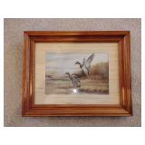 Mallards Ducks Offset Lithograph Print, by Ruane Manning, Natural Wood Frame, ducks flying over marsh, 19 3/4' W x 15 1/2'.