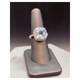 Beautiful sterling ring with aquamarine color and clear stones…..size 6-1/2 and 6 grams