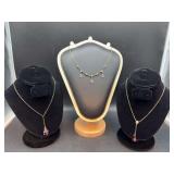 Grouping of (3) gold-tone and silver-tone necklaces with colorful stones