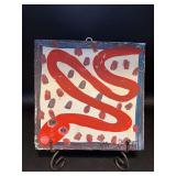 Authentic and original Mose T Folk Art Red Snake with signature soda can tab hanger…..9-1/2 x 9-1/2