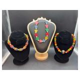 Grouping of (3) brightly colored wood bead necklaces