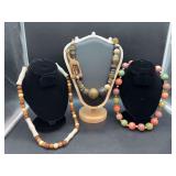 Grouping of (3) chunky wood beaded necklaces
