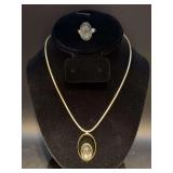 Gold-tone snake chain with moonstone pendant and silver-tone adjustable band moonstone ring