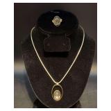 Gold-tone snake chain with moonstone pendant and matching adjustable band moonstone ring