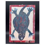 Authentic and original Mose T Folk Art Navy Blue and Red Frog with signature soda can tab hanger…..10-1/4 x 14-3/4