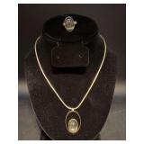 Gold-tone snake chain with moonstone pendant and matching adjustable band moonstone ring