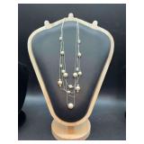 Vintage Luz Claiborne multi-strand necklace with pearl-like beads and rhinestone accents