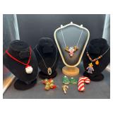 Grouping of holiday costume jewelry….clip-on back missing on one tree earring