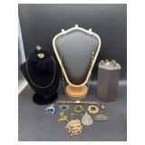 Grouping of costume jewelry…..necklaces, adjustable back moonstone rings, brooches and more